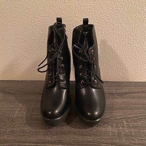Black high heel combat boots